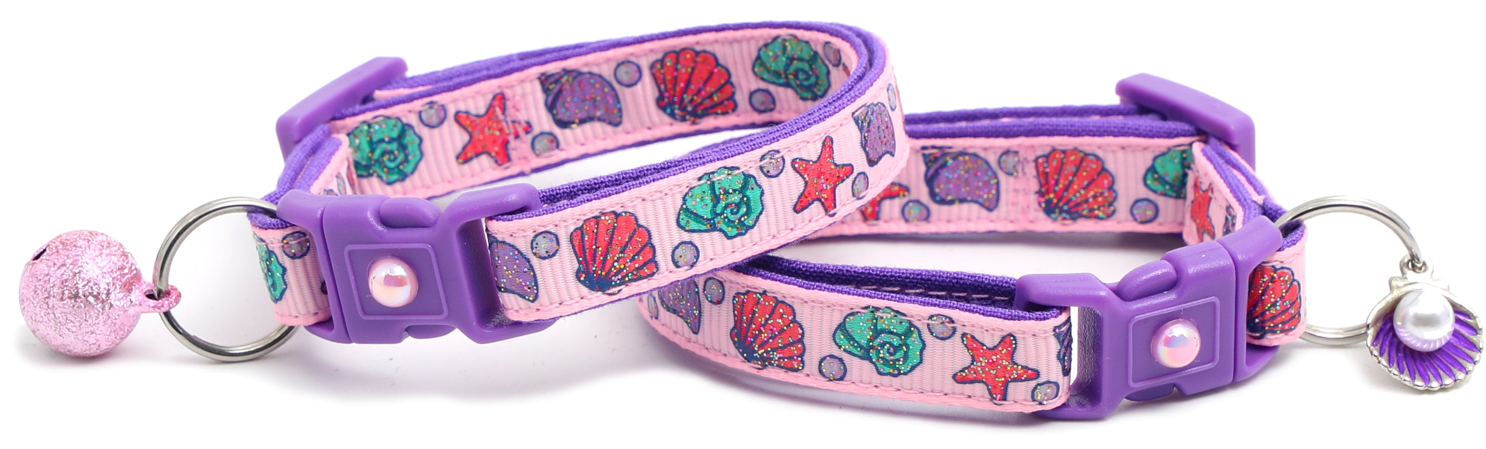 Beachcomber Breakaway Cat Collar in vibrant colors, featuring a breakaway clip and removable bell, made from soft reinforced cotton.